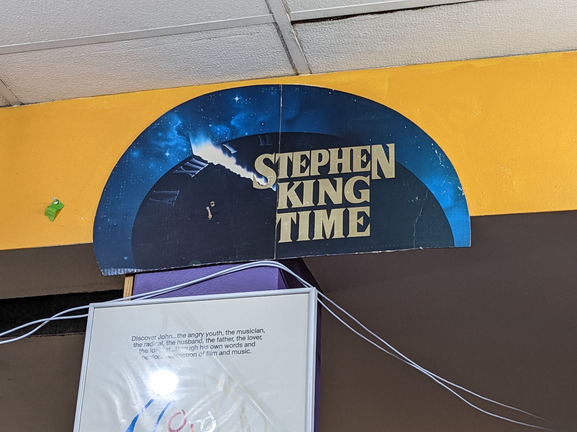 A mounted promotional sign that says "Stephen King Time."