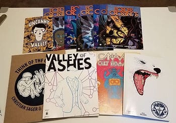 A spread of comics that I’ve written and published.